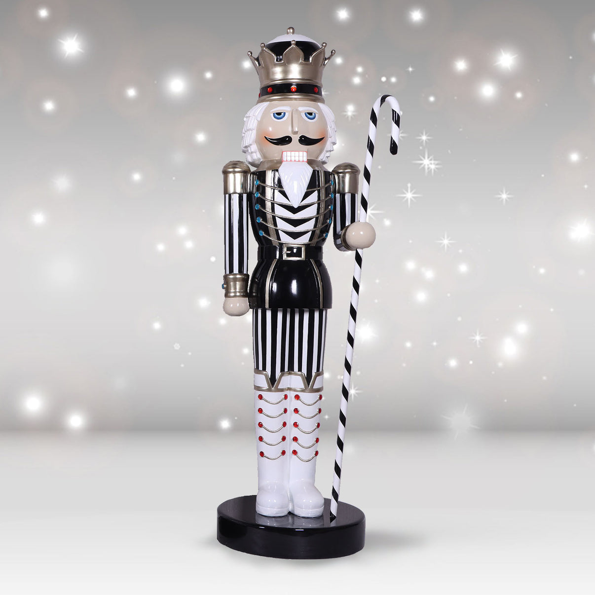 Decorative nutcracker figure with a candy cane on a sparkling background