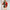 Decorative 6.5 foot toy soldier figure with red, green, and white colors on a sparkling background.